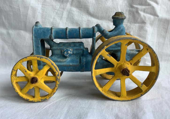 Vintage New Zealand metal tractor toy made by Fun Ho